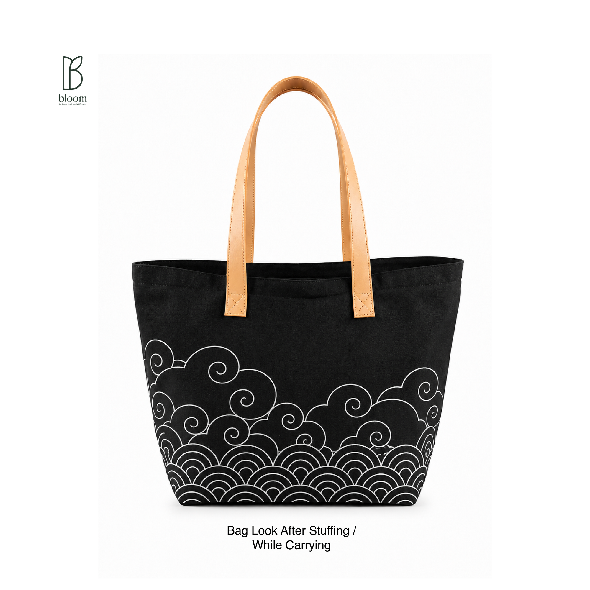 Kumo canvas tote bag fully packed and carried, showing everyday shape and capacity